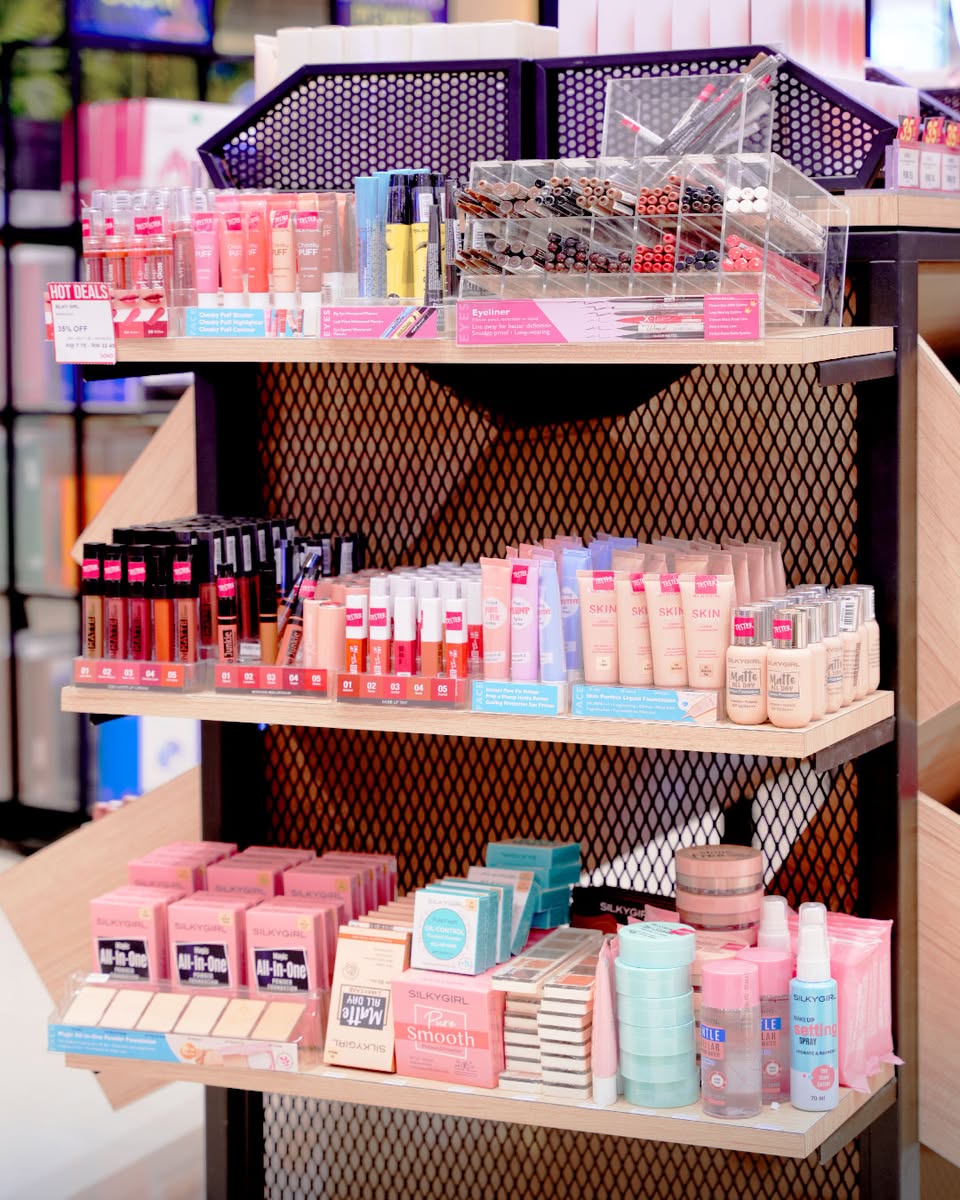 Customers browsing products at the new Sa Sa outlet.