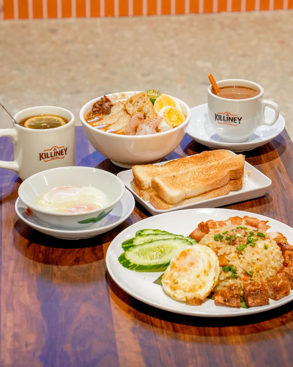 A classic Singaporean breakfast spread featuring kaya toast and coffee