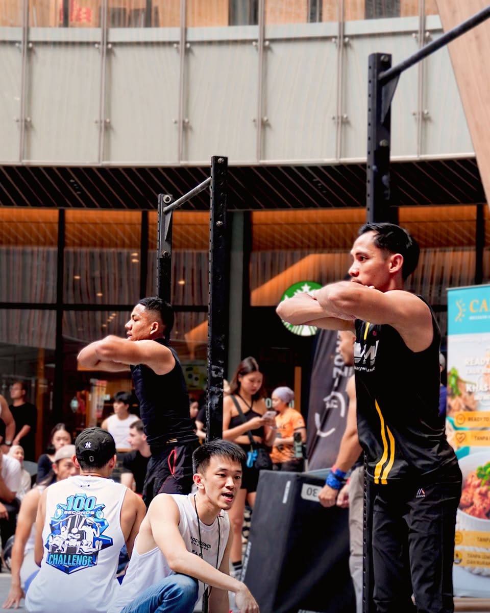 A triumphant moment for participants at the 100 Seconds Challenge FLEX