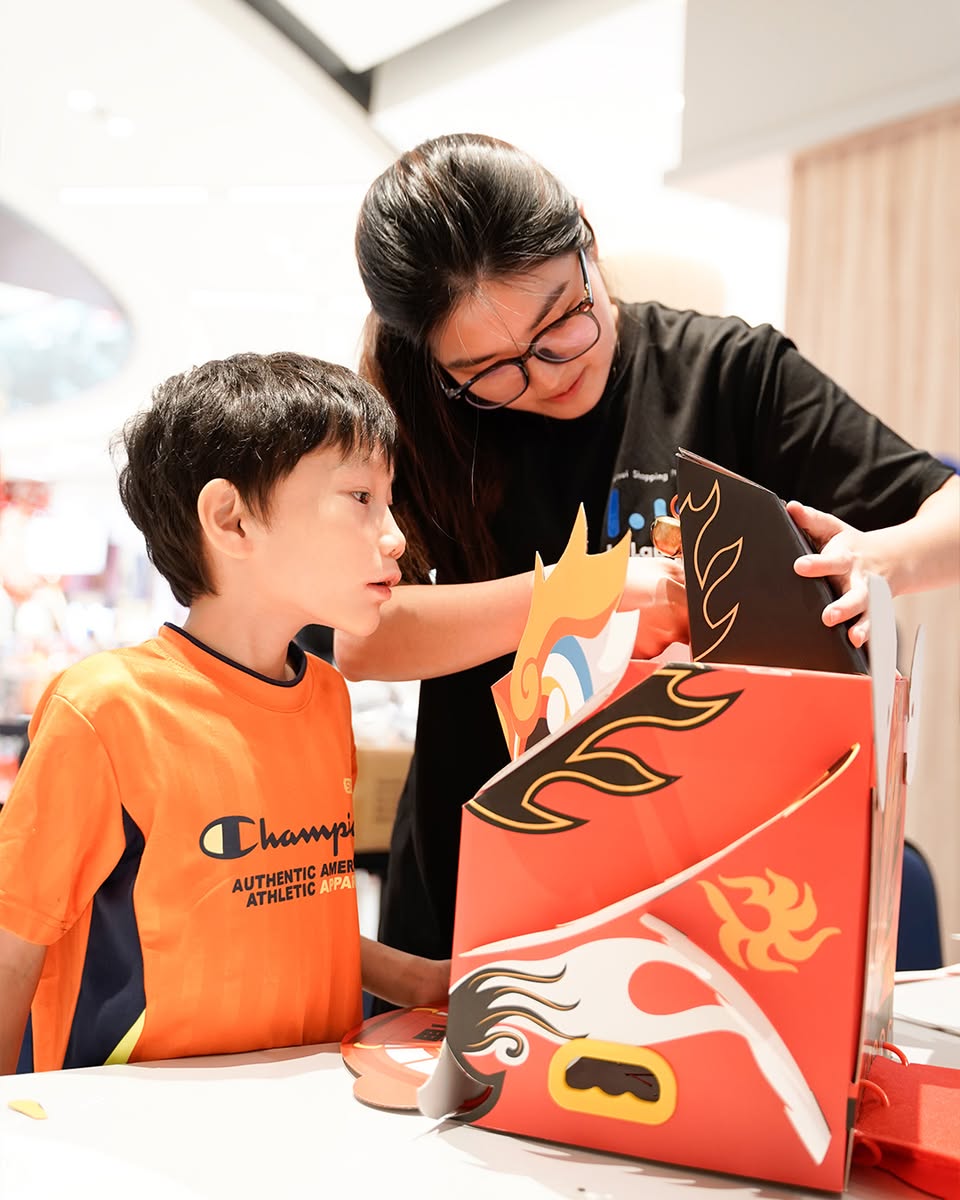 Children participating in a festive craft workshop