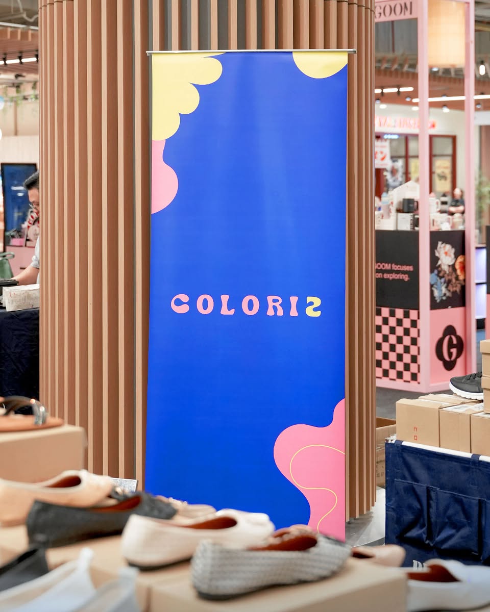 Close-up of stylish sling bags showcased at the Coloris Pop-Up.