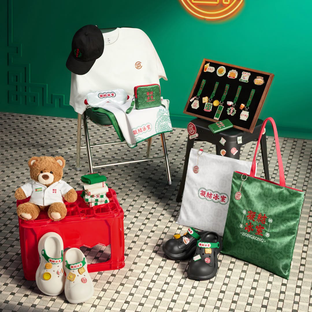CLOT CAFE merchandise including tote bags, aprons, clogs and keychains