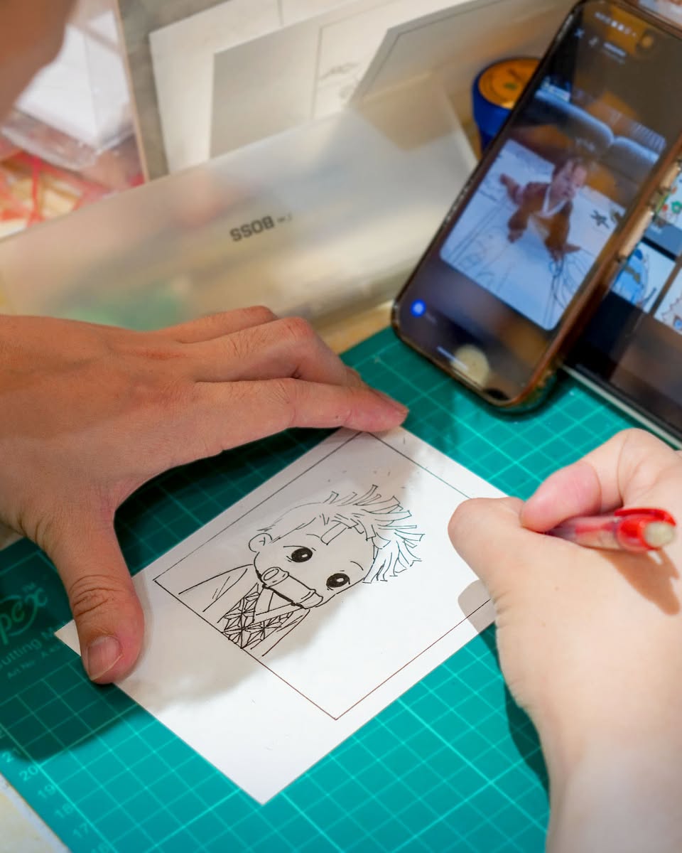 Enthusiasts exploring a diverse collection of anime and comic-inspired goods