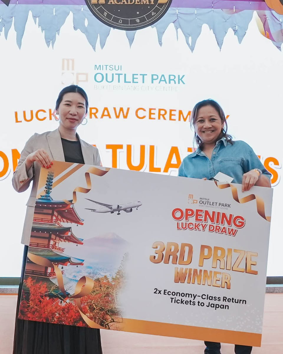 Prize recipients posing with their awards at LaLaport BBCC.