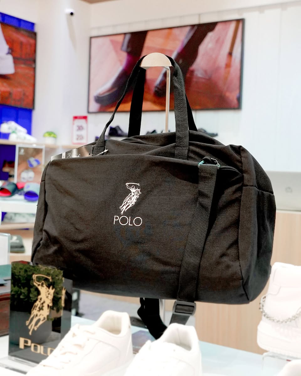 Shoppers browsing the new POLO HAUS store