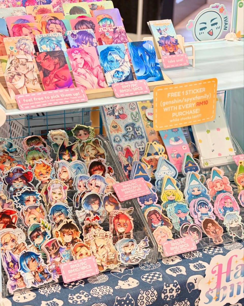 Sticker packs and acrylic standees at ACG Mart 2.0
