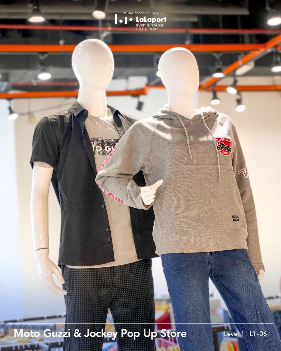 A vibrant display of apparel and accessories at the Jockey & Moto Guzzi pop-up store.