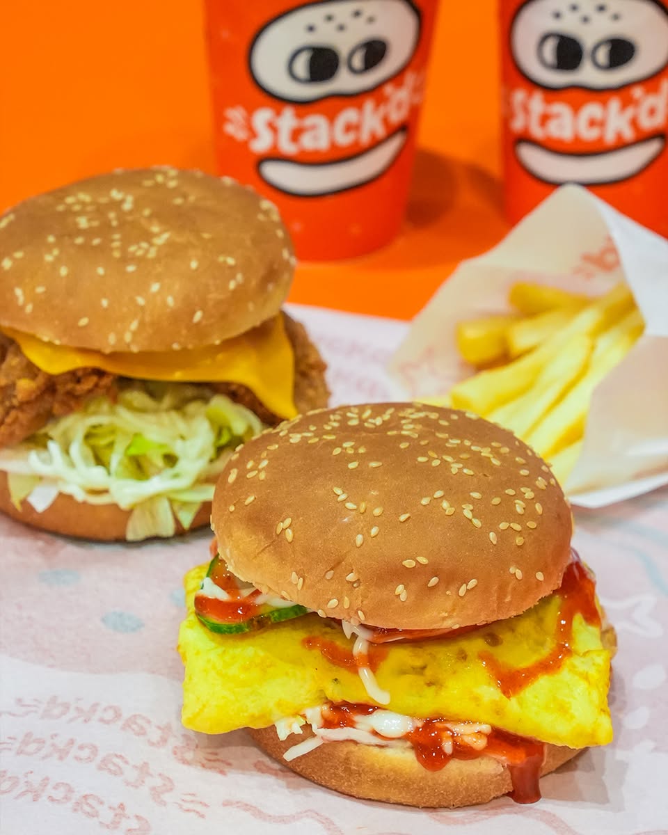 Close-up of a signature stack'd burger with local spices