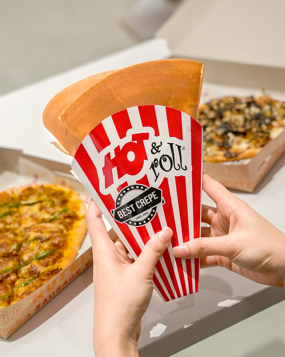 The inviting storefront of Hot & Roll, iMP’za.