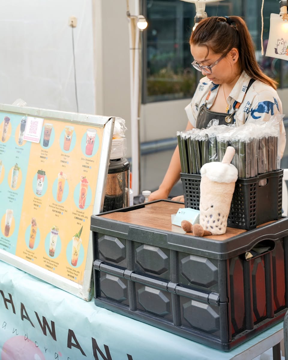 Attendees enjoying the vibrant atmosphere at the Singles' Market