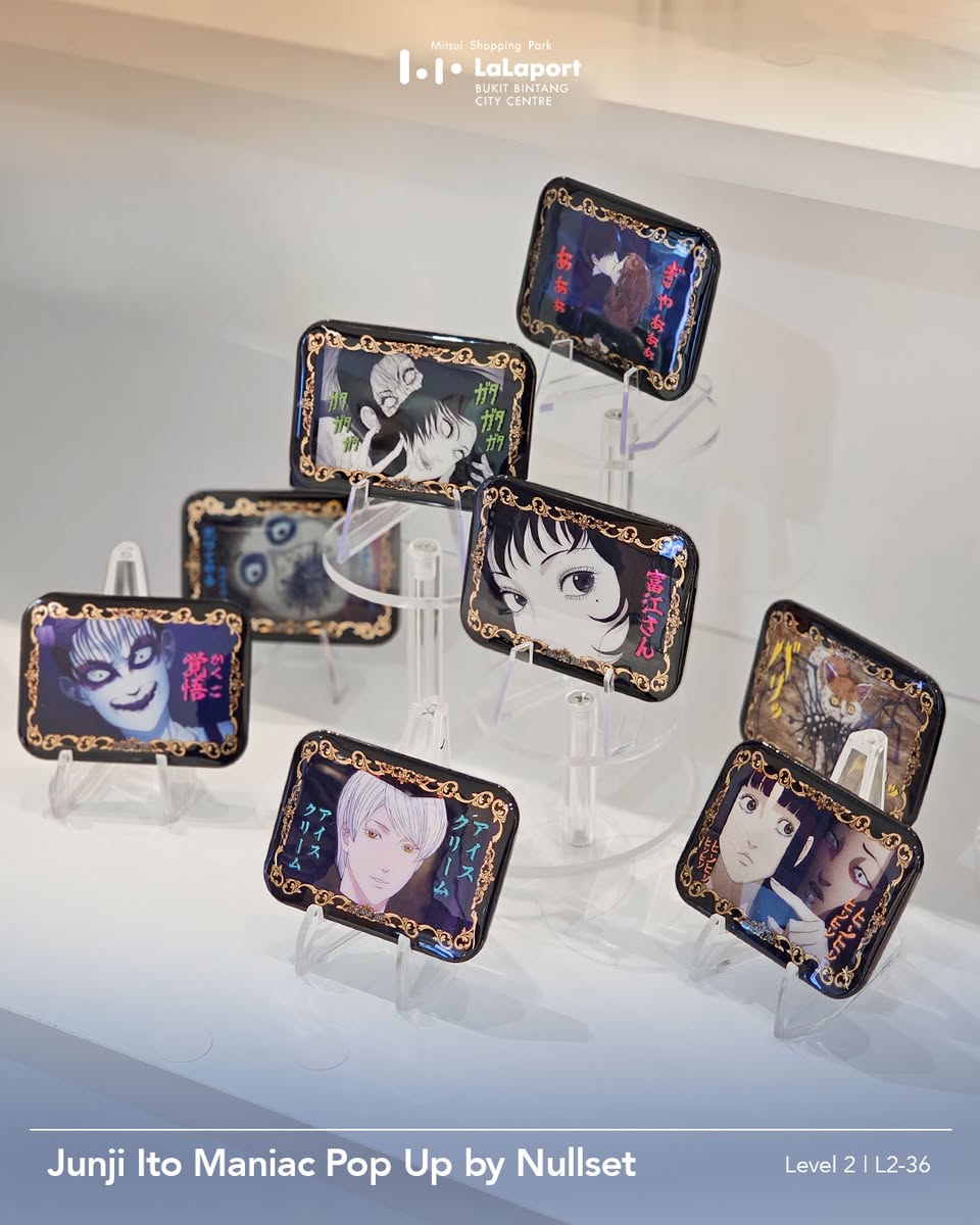 An array of exclusive merchandise from the Junji Ito Pop-Up, including figures and graphic tees.