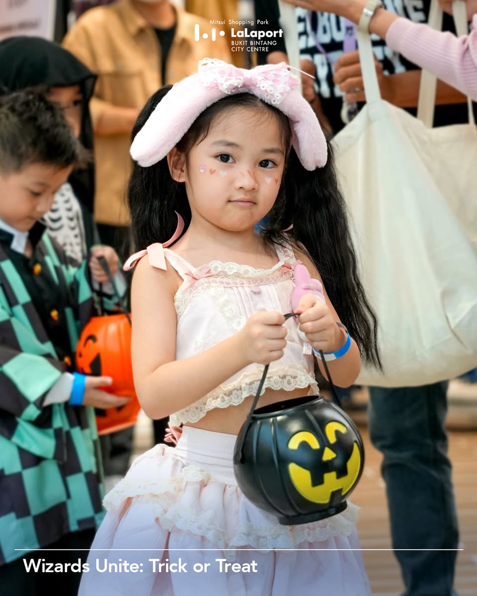 Joyful participants in costume during LaLaport BBCC's Trick or Treat walk.