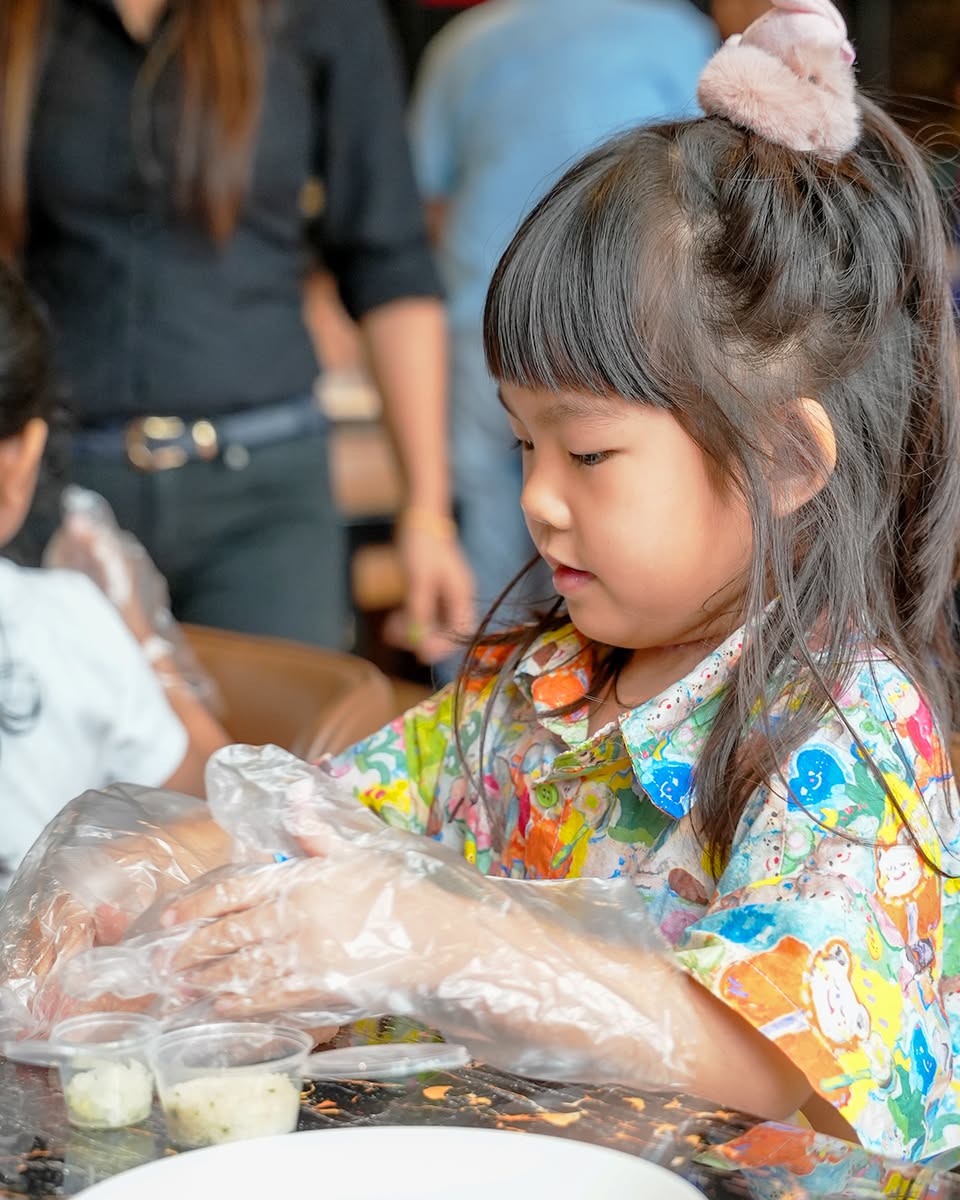 Young chefs participating in the workshop