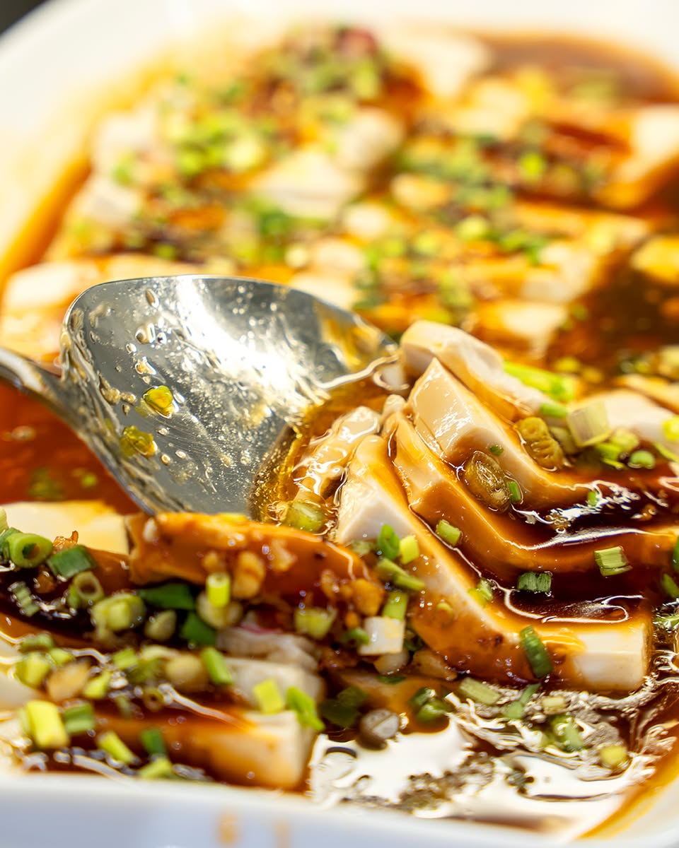 A plate filled with a customized economy rice meal, ready to be enjoyed.
