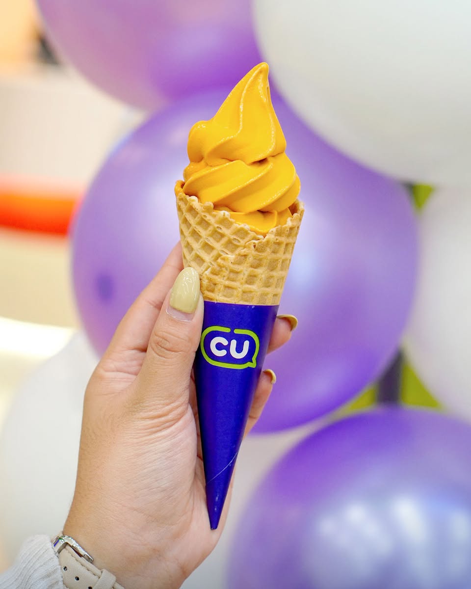 CU Mart store front with opening promotions