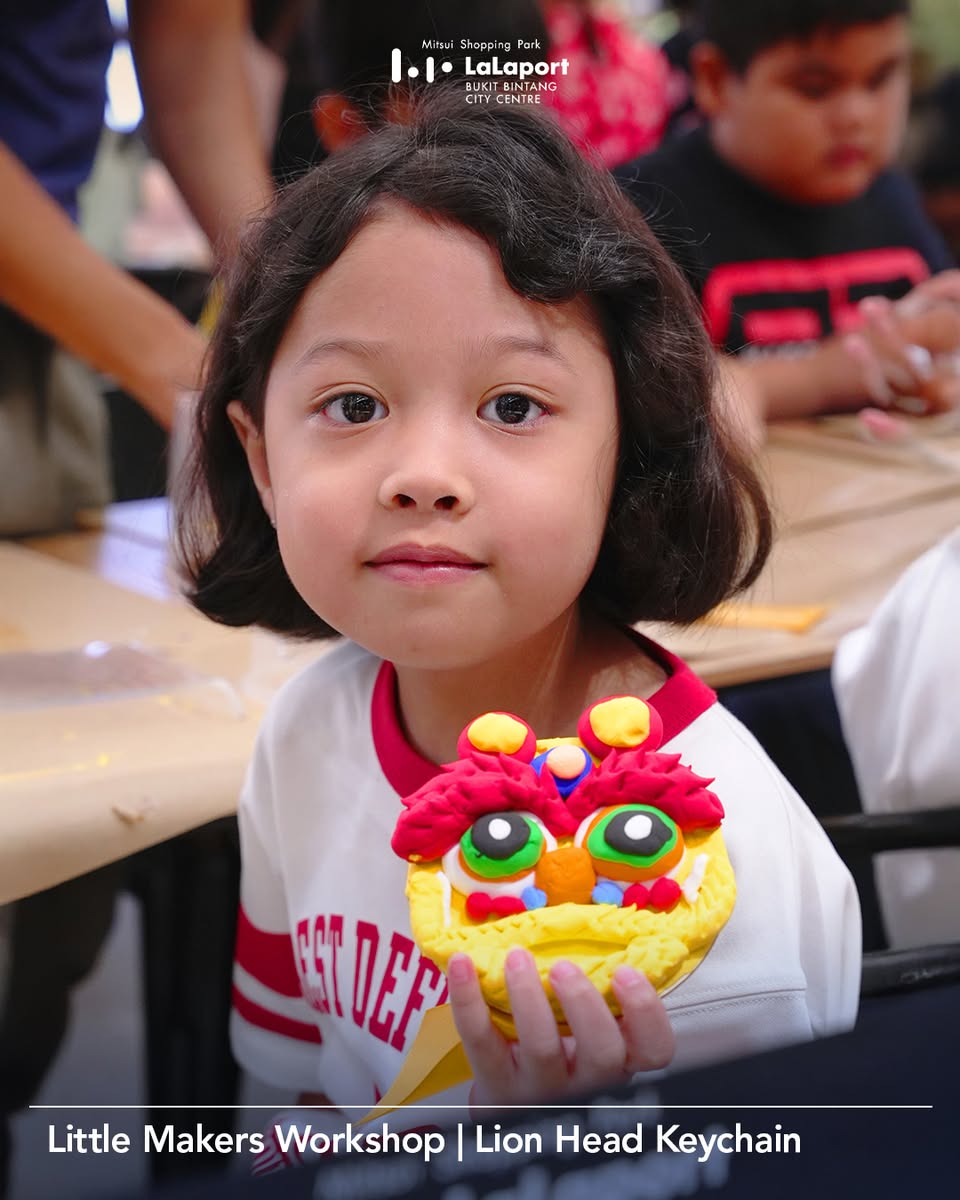 Kids showing off their finished crafts