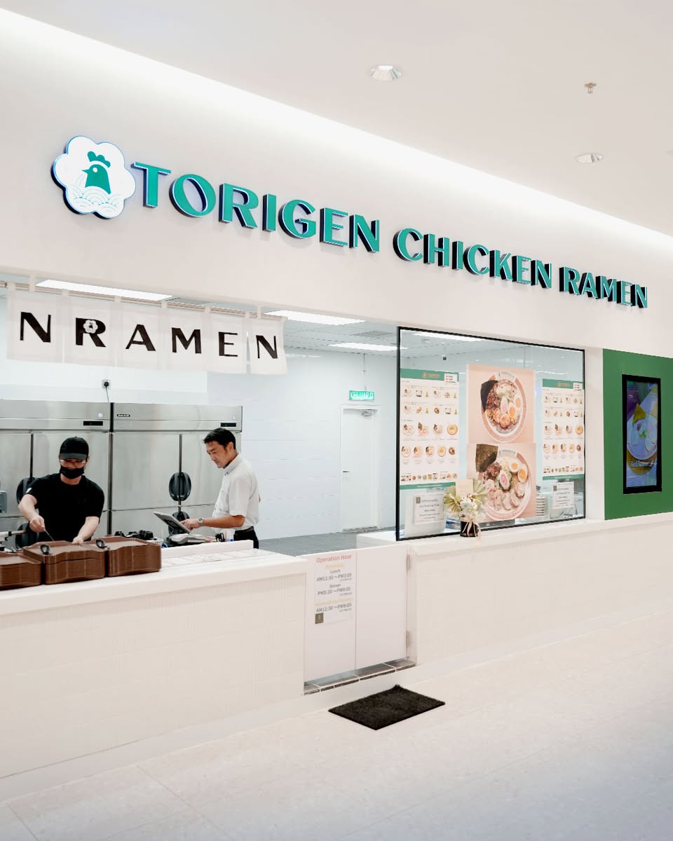 Interior view of Torigen Chicken Ramen restaurant with customers enjoying meals