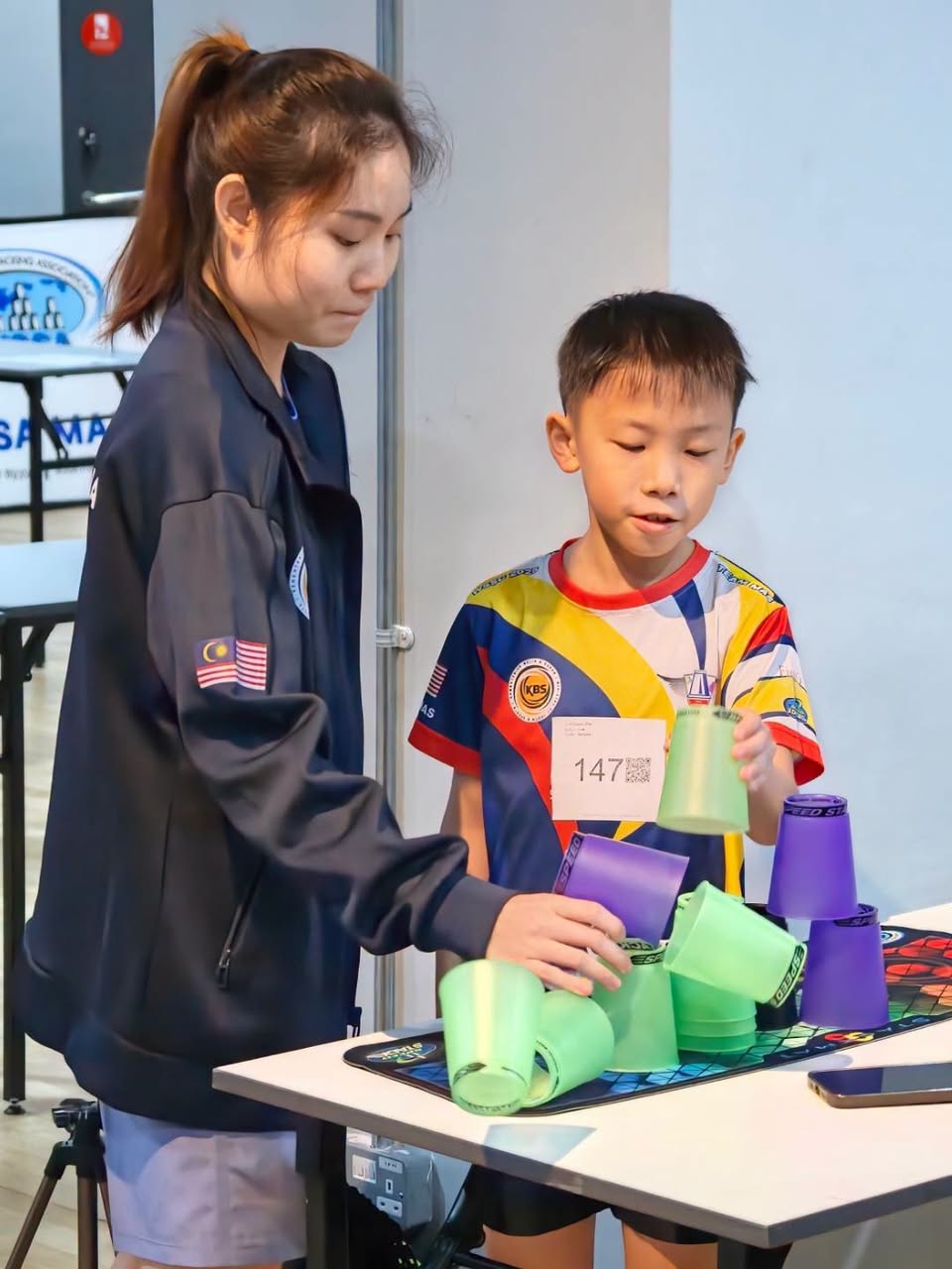 Sport stacking competitor in team jersey