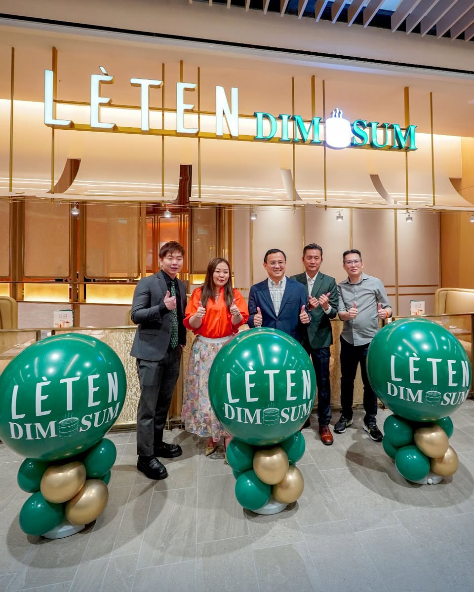 Close-up of a steaming basket of dumplings, highlighting the fresh ingredients.