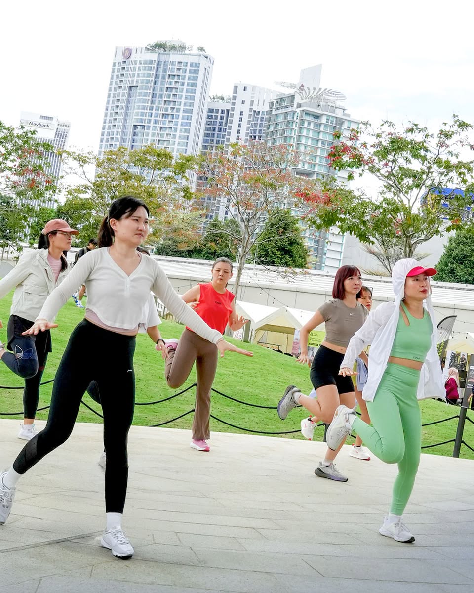 Participants engaging in a lively fitness session at MyWellFair 2025