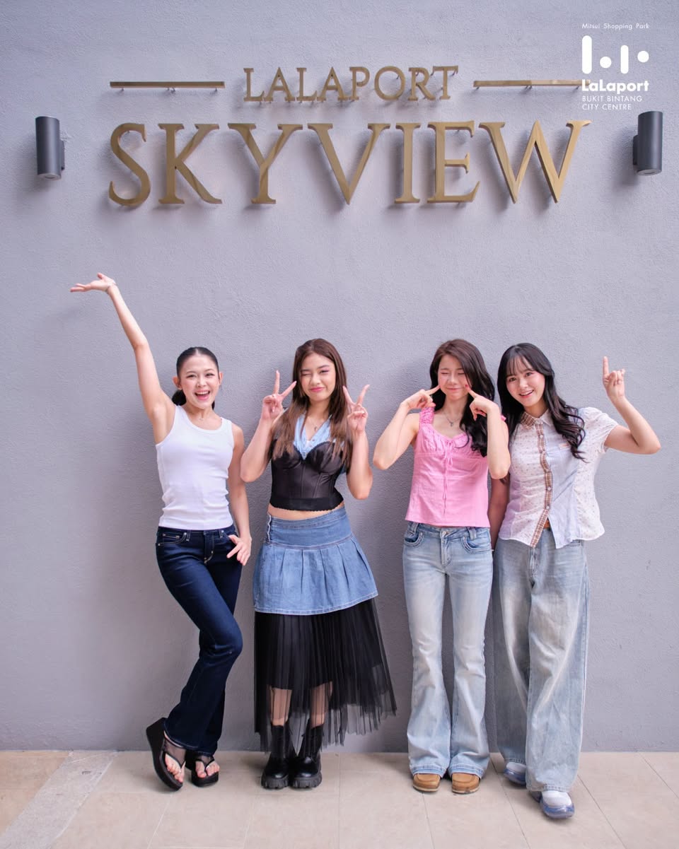 Group posing at LALAPORT SKYVIEW signage at Bukit Bintang City Centre