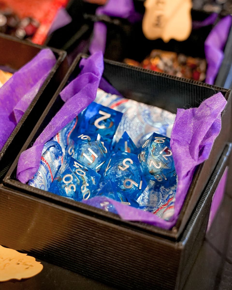 Attendees enjoying a lively board game session at Dice N Dine Trick or Treat