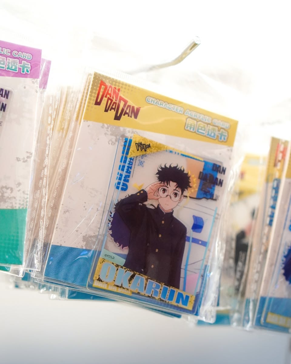 A close-up of popular character figures and merchandise available at the event