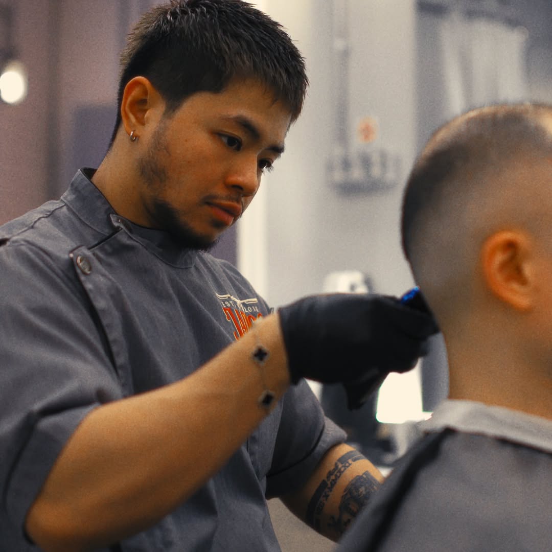 Barber at work at Jadioc Barbershop LaLaport BBCC