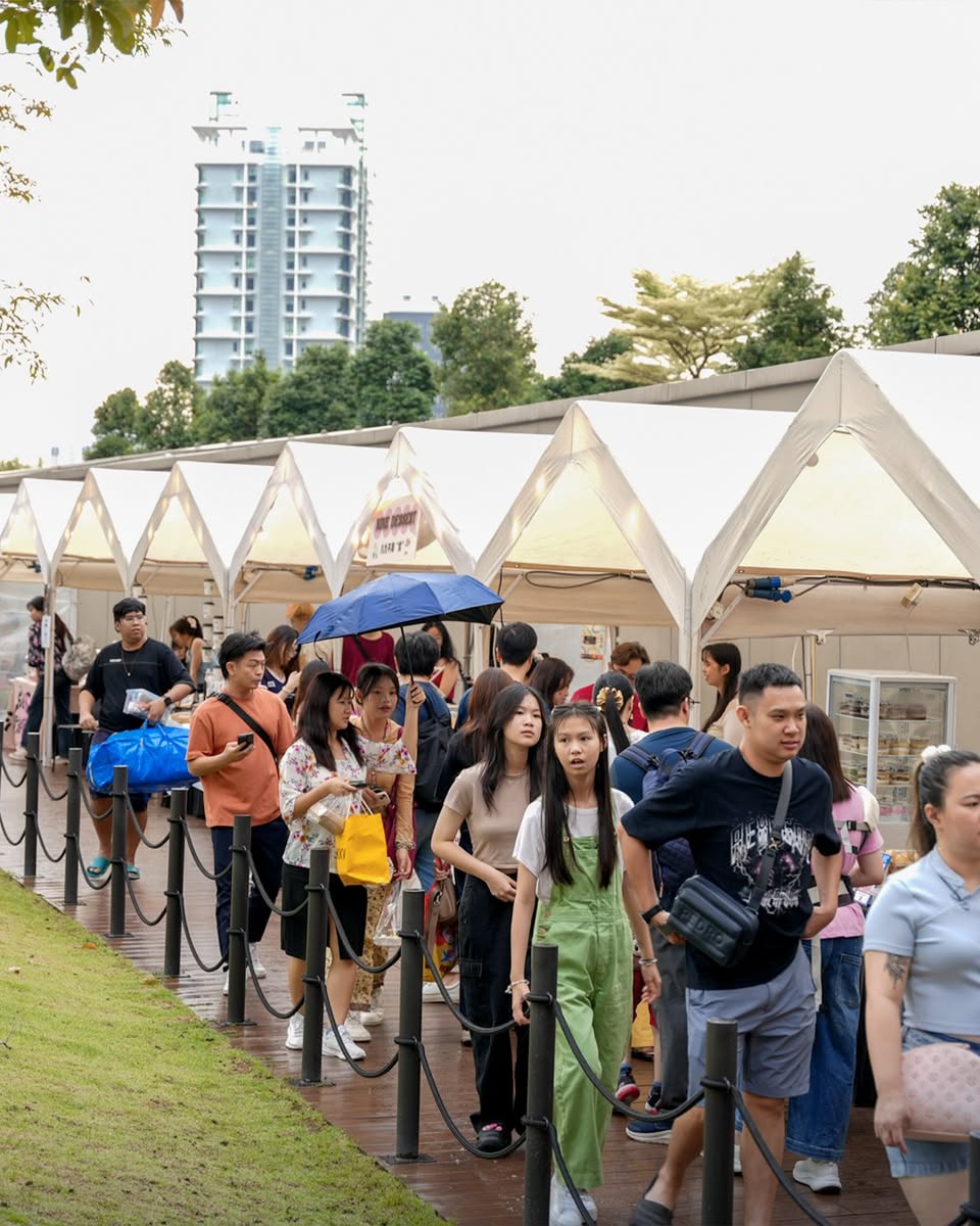 A couple participating in Cupid Archery at the Singles' Market event