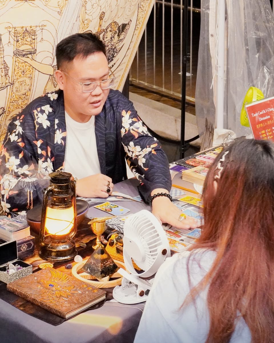 Various craft items, including fans and lanterns, on display