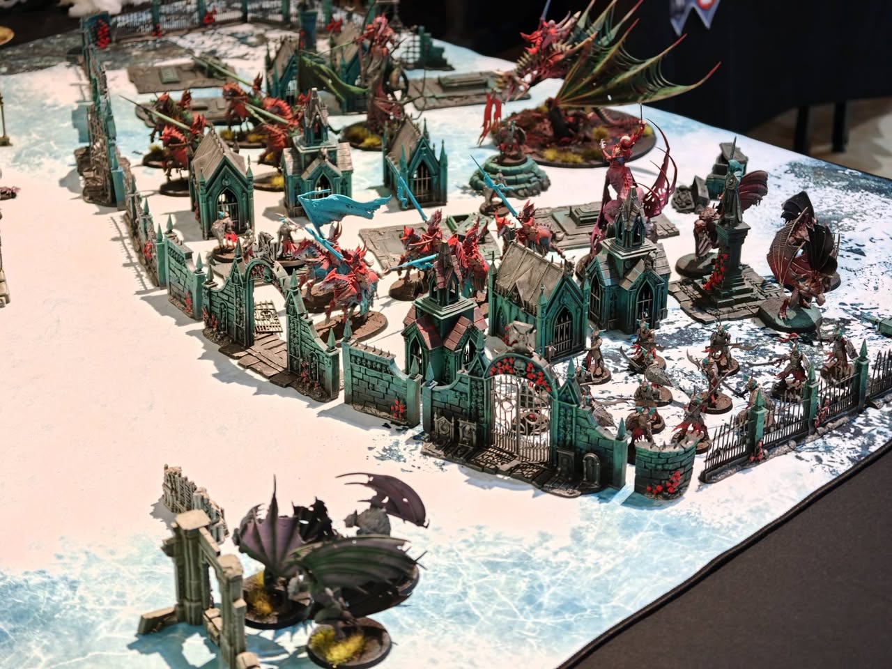 Fantasy miniature castle and dragon display at Spellbinder
